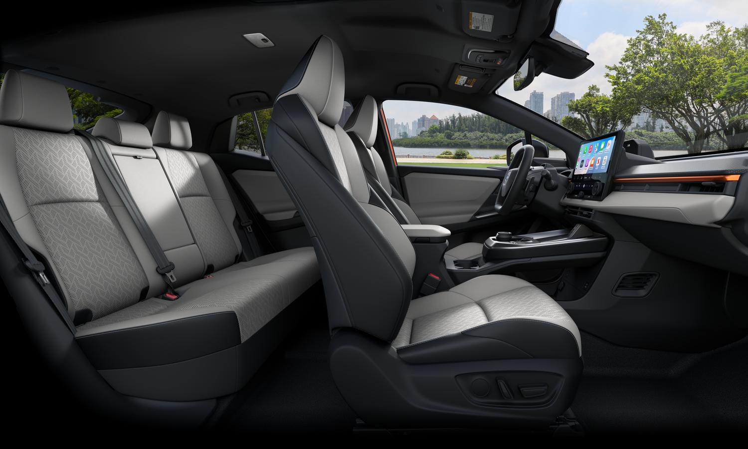 2026 Subaru Uncharted interior showing light gray front and rear seating